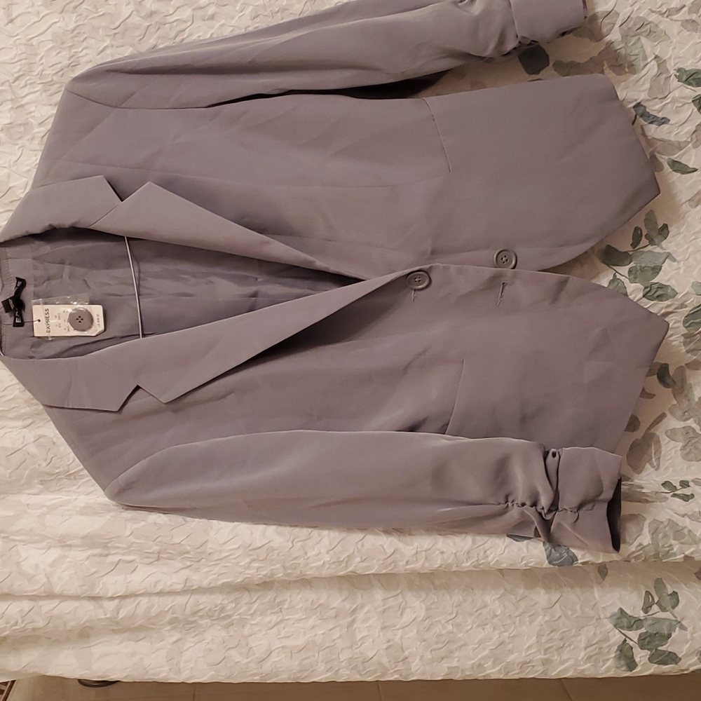 beautiful  blazer  in a size  8.